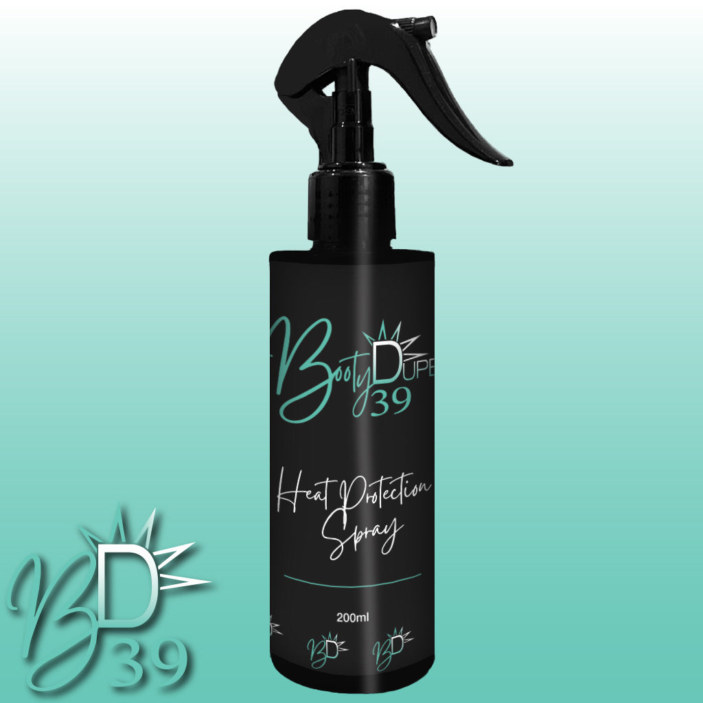 A black spray bottle labeled "Heat Protection Spray" by BOOTY DUPE promises salon-quality results with hair strengthening benefits. The sleek, modern design is set against a gradient teal background and features an additional "BD 39" logo in the bottom left corner.