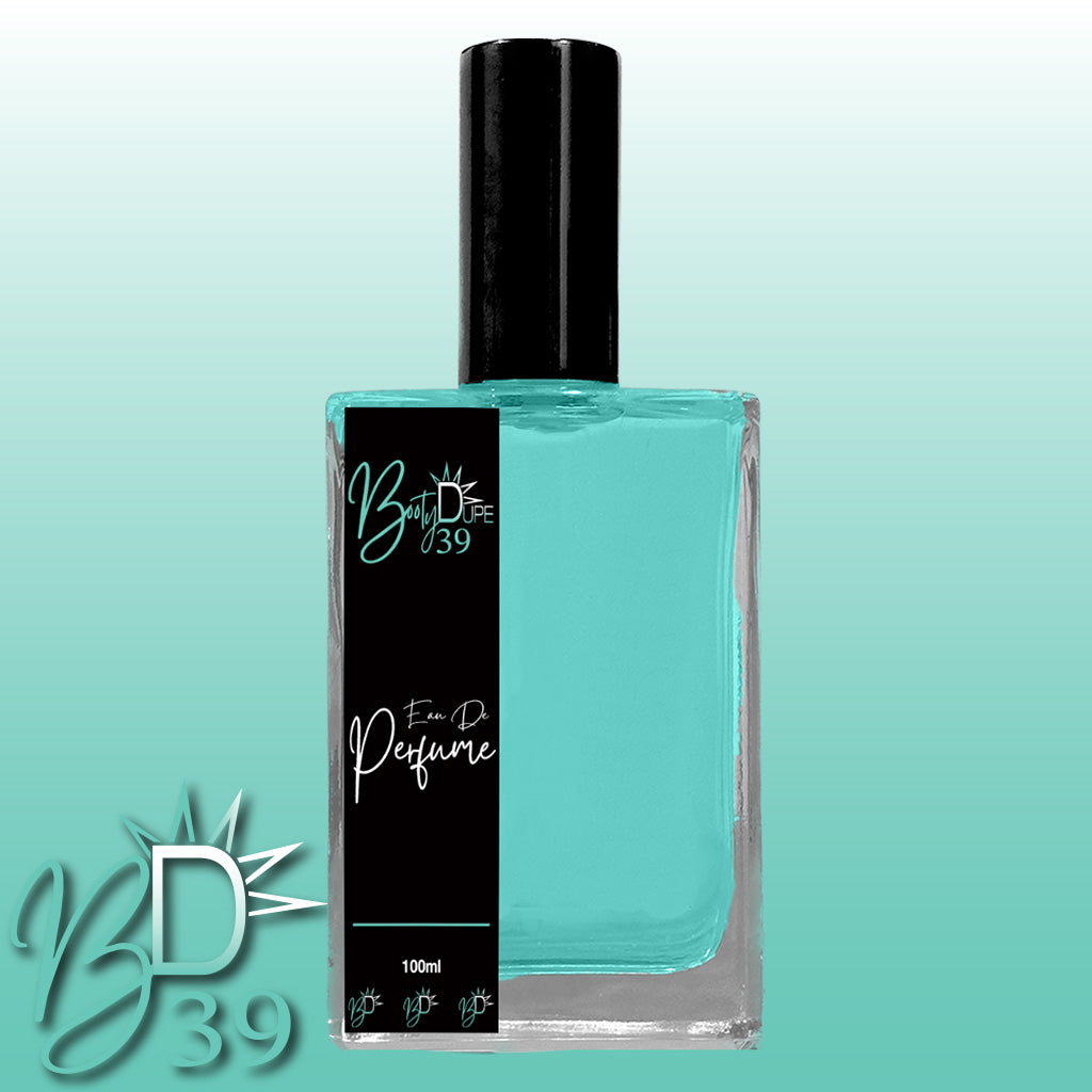 An elegant perfume bottle containing a gradient turquoise liquid topped with a sleek black cap. The label displays "Eau De Perfume" by BOOTY DUPE in stylized font. This tropical fragrance, celebrated for its long-lasting allure, showcases a sun-like logo and "Booty Dupe Perfume" on a soft turquoise gradient background.