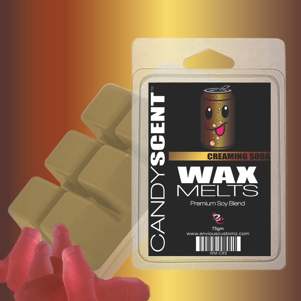 Package of CANDYSCENT™ Wax Melts featuring a creamy soda scent, adorned with a soda can face on the label and surrounded by fragrant paradise wax cubes and red gummy candy fish set against a gradient background.