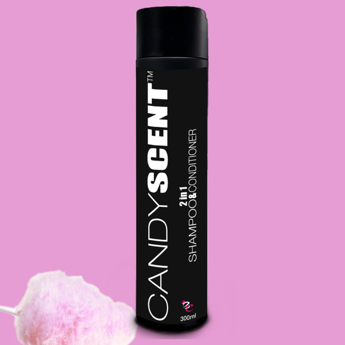 A black bottle labeled "CANDYSCENT™ 2 in 1 Shampoo & Conditioner" against a pink background. The sleek design features white text and a small image of pink cotton candy in the bottom left corner. This 300ml bottle promises a silky finish for your hair.