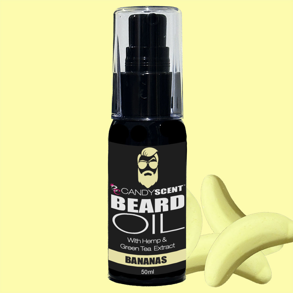 A 50ml bottle of CANDYSCENT™ Beard Oil by Candy Scent is set against a light yellow background. The black bottle with a clear cap features a label adorned with a bearded man logo, highlighting its contents of hemp and green tea extract infused with the scent of banana. Two illustrations of bananas are depicted on the side, emphasizing its essential role in beard health.