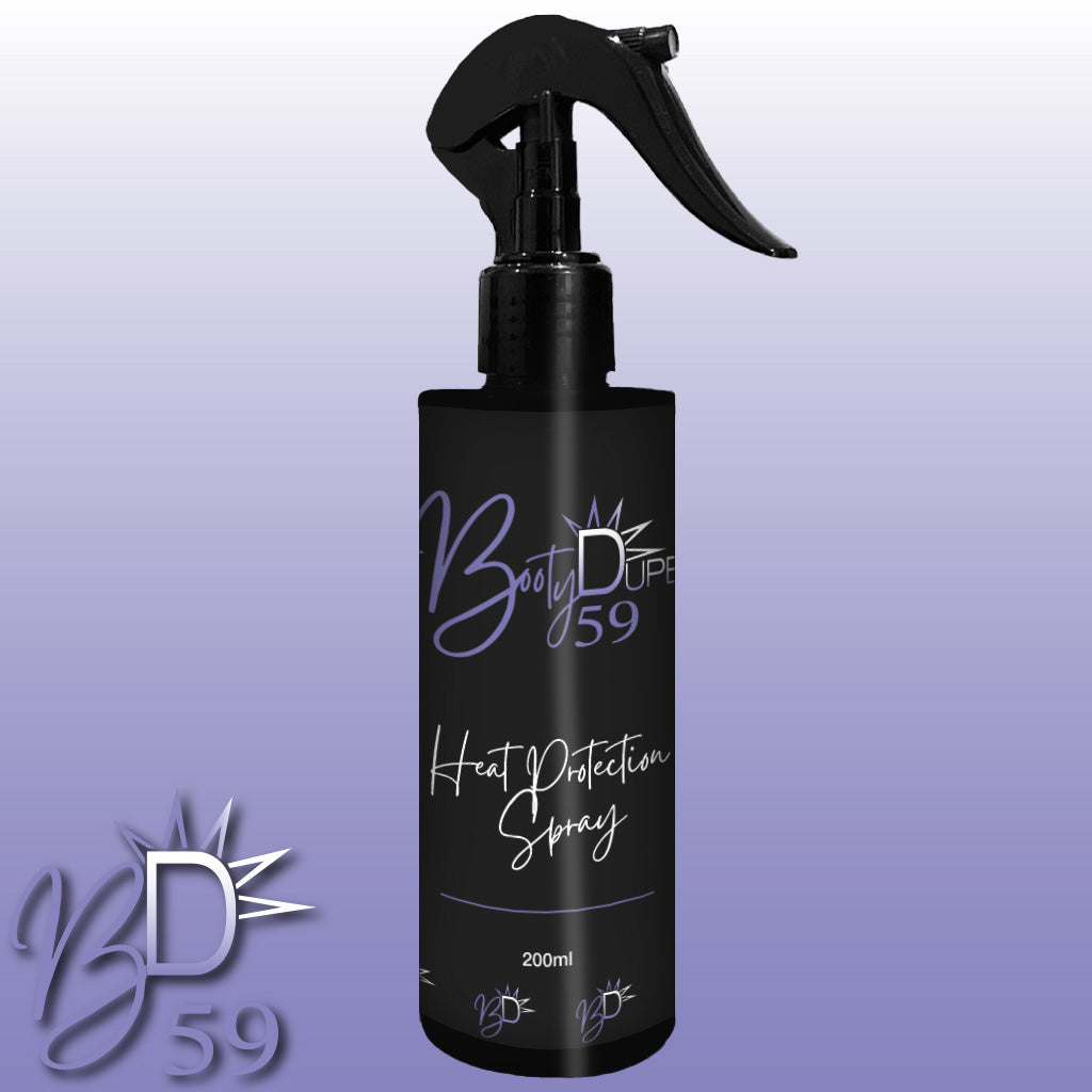 A black spray bottle with "Heat Protection Spray" written in white text stands against a gradient background transitioning from white to purple. Promising salon-quality results, the BOOTY DUPE logo and "BD 59" are visible in the bottom left corner.