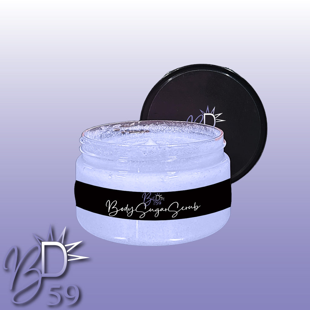 A jar of BOOTY DUPE Body Sugar Scrub, ideal for all skin types, with a black lid open and placed behind it. The light purple jar features a black label with white text reading "Body Sugar Scrub." The background transitions from light to dark purple and includes the "BD59" logo in the bottom left corner.