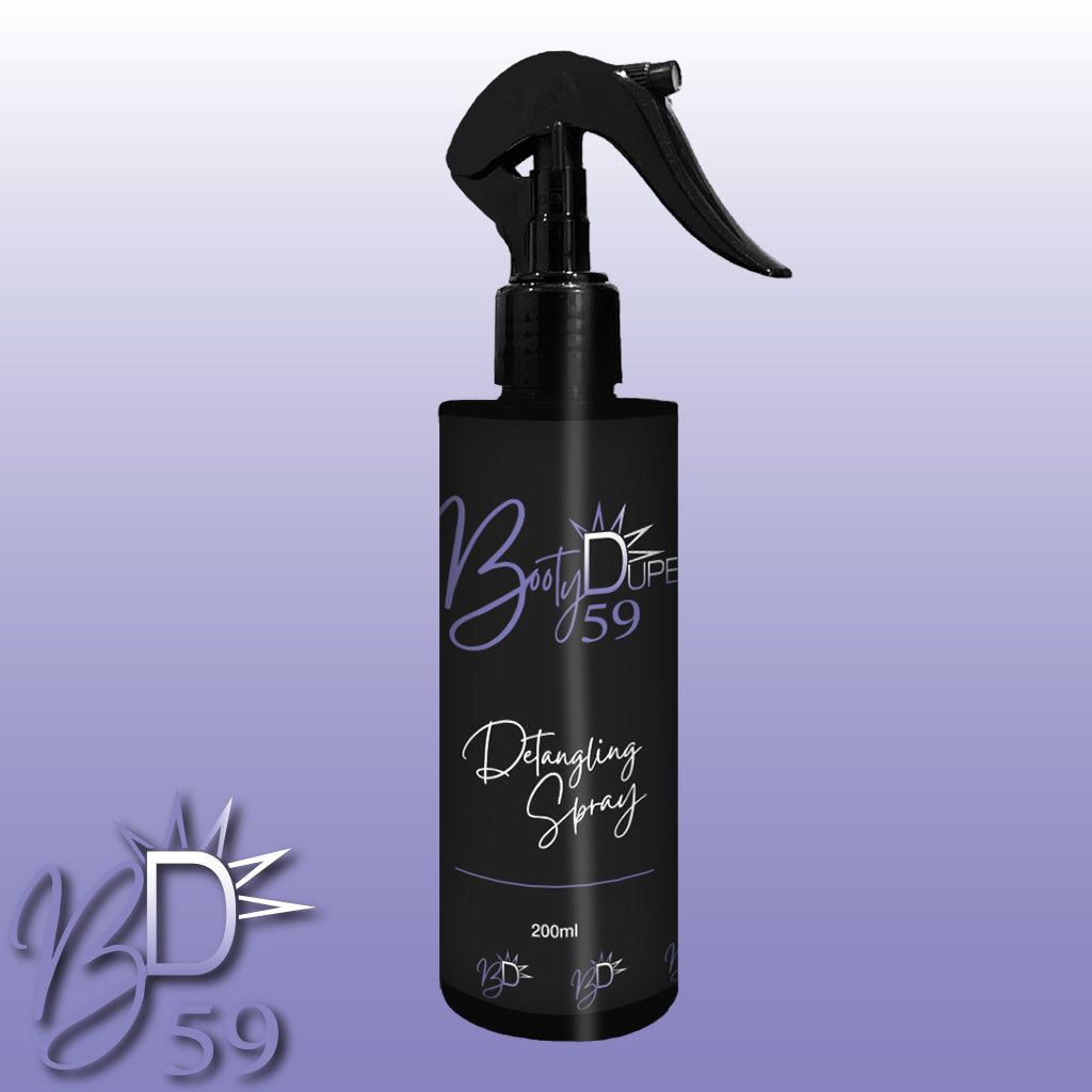 A 200ml bottle of BOOTY DUPE Hair Detangling Spray with a spray nozzle, set against a gradient background transitioning from light to dark purple. The black bottle features white and light purple text, highlighting its Aloe Vera and Jojoba Oil formula suitable for all hair types.