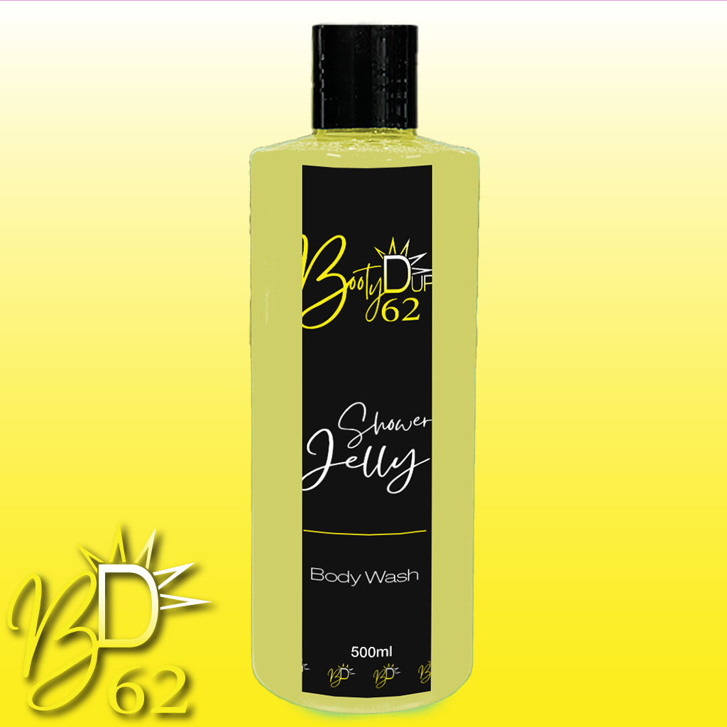 A 500ml bottle of BOOTY DUPE Shower Jelly Body Wash is displayed against a gradient yellow background. The bottle has a black cap and a label with a black and yellow design, featuring the brand name and product description. This nourishing body cleanser showcases the BOOTY DUPE logo in the bottom-left corner.