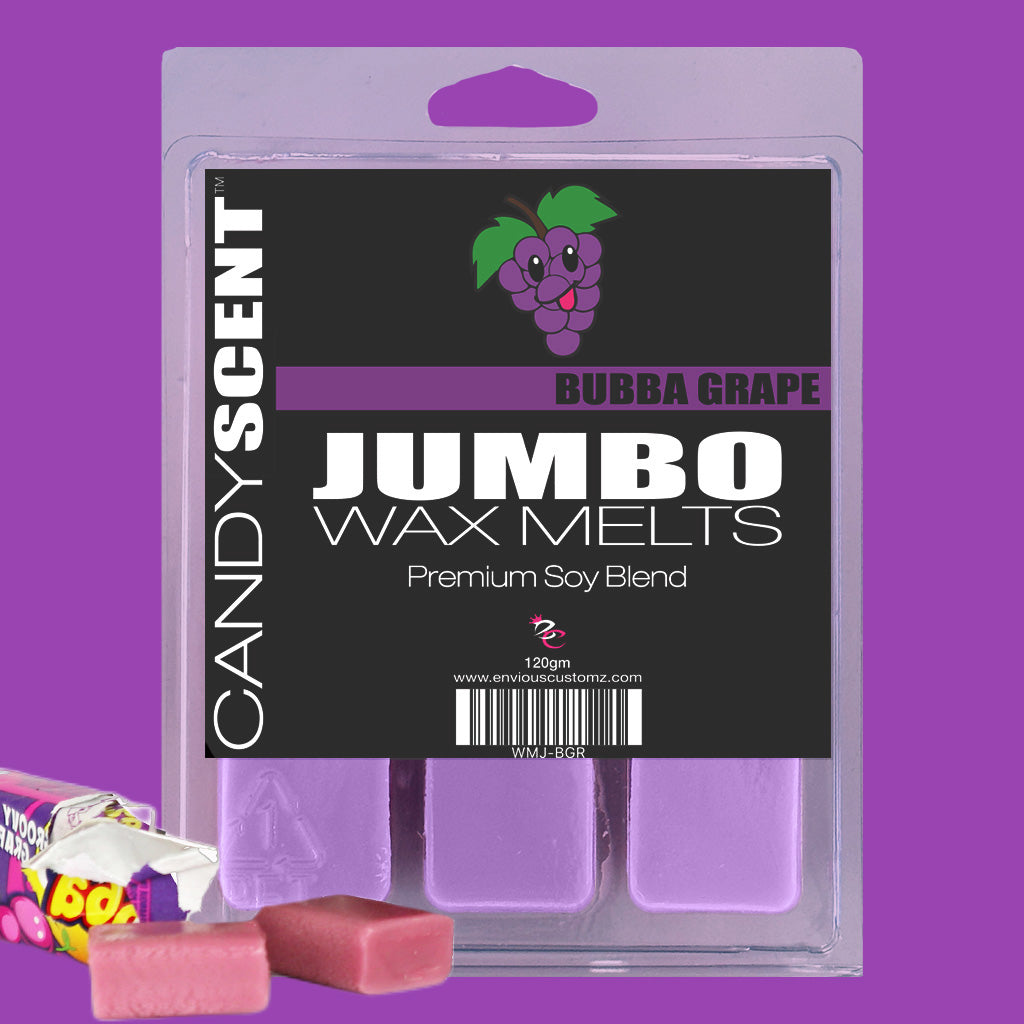 Packaging for CANDYSCENT™ Jumbo Wax Melts in Bubba Grape flavor. Featuring a premium soy blend, the label showcases a grape illustration. In the background, pink candy pieces and a partially visible candy wrapper accentuate the long-lasting aroma of these highly scented jumbo wax melts.