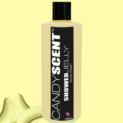 A 500ml bottle of CANDYSCENT™ Shower Jelly Body Wash is displayed against a light yellow background. The transparent bottle features a black cap and a black label with the product name in bold white letters. Partially visible banana graphics are present in the background.