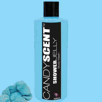 A light blue bottle with a black cap, labeled "Shower Jelly Body Wash" from the CANDYSCENT™ brand, stands against a matching blue background. Three blue jelly candy pieces are positioned at the bottom left of the image. The bottle has a 500ml capacity.