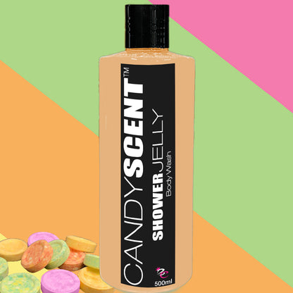 A bottle of CANDYSCENT™ Shower Jelly Body Wash with a vibrant label is displayed against a colorful background featuring diagonal stripes in orange, pink, and green. Assorted pastel-colored soap discs sit in the bottom left corner. This 500ml body wash promises a moisturizing experience.