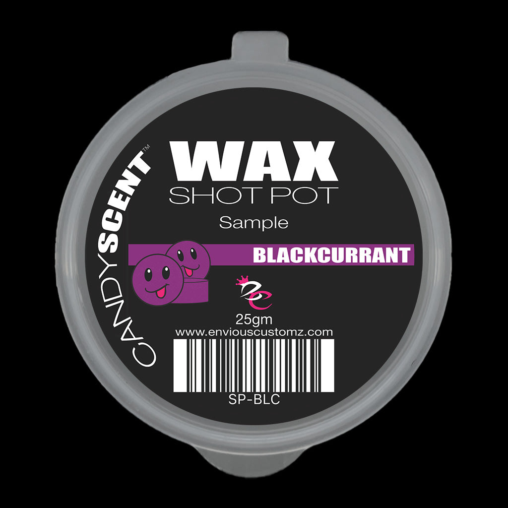 Circular black container lid labeled "(DISCONTINUED CANDYSCENT™'S) Wax Melts Sample" with "BLACKCURRANT" highlighted in pink. It features two smiling purple cartoon faces, a barcode, and offers a delightful home fragrance experience. This 25gm sample of wax melts is perfect for trying before you buy.