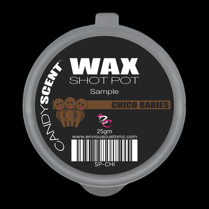 A round container labeled "(DISCONTINUED CANDYSCENT™'S) Wax Melts" presents the scent "CANDYSCENT" along with "Chico Babies" against a black background. Seamlessly combining home fragrance with a playful touch, the label includes small cartoon characters and a barcode at the bottom, making it perfect for wax melt enthusiasts.