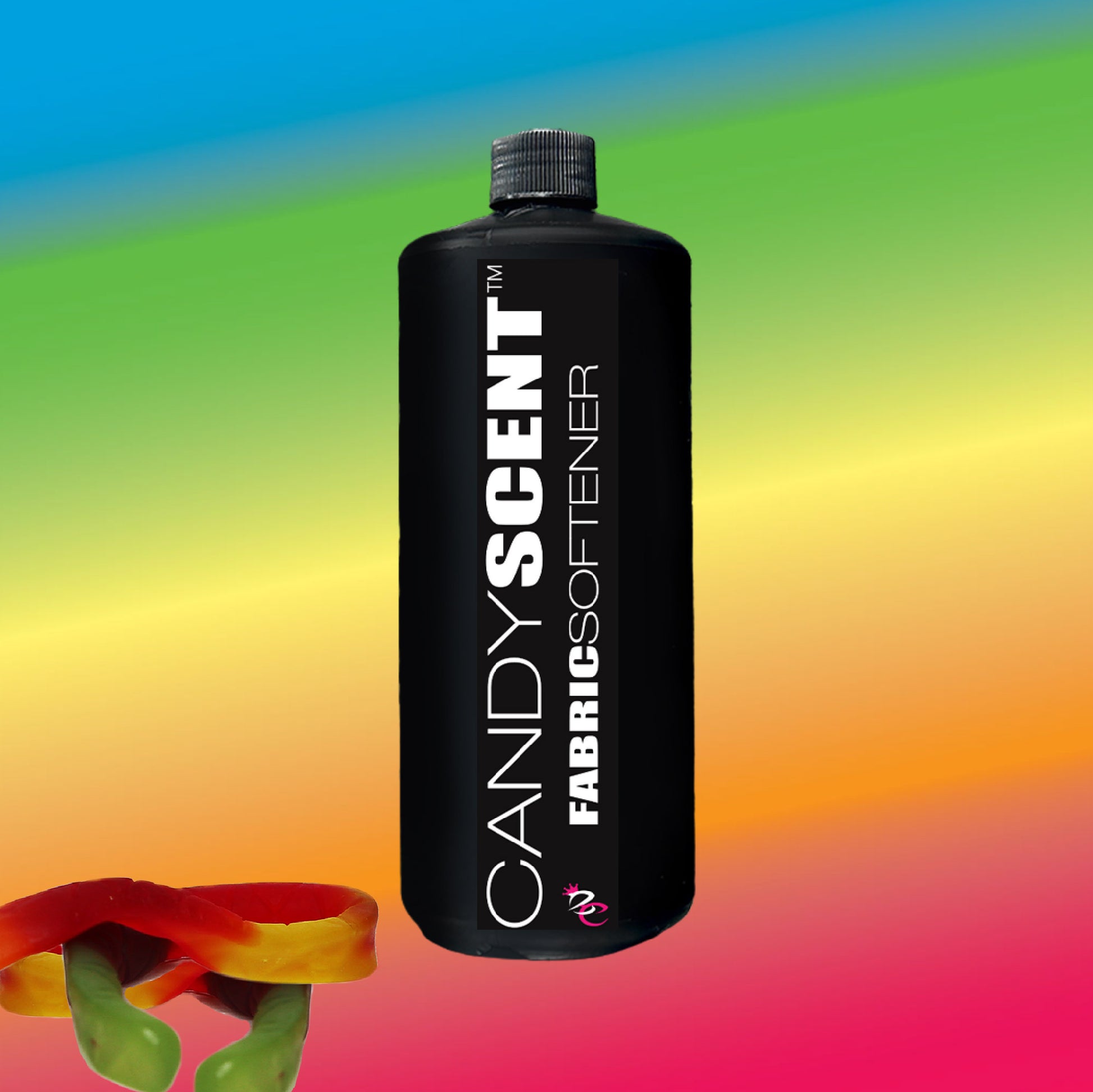 A black bottle of CANDYSCENT™ fabric softener set against a vibrant rainbow gradient background promises a static-free experience, with a colorful gummy candy featured in the bottom left corner.