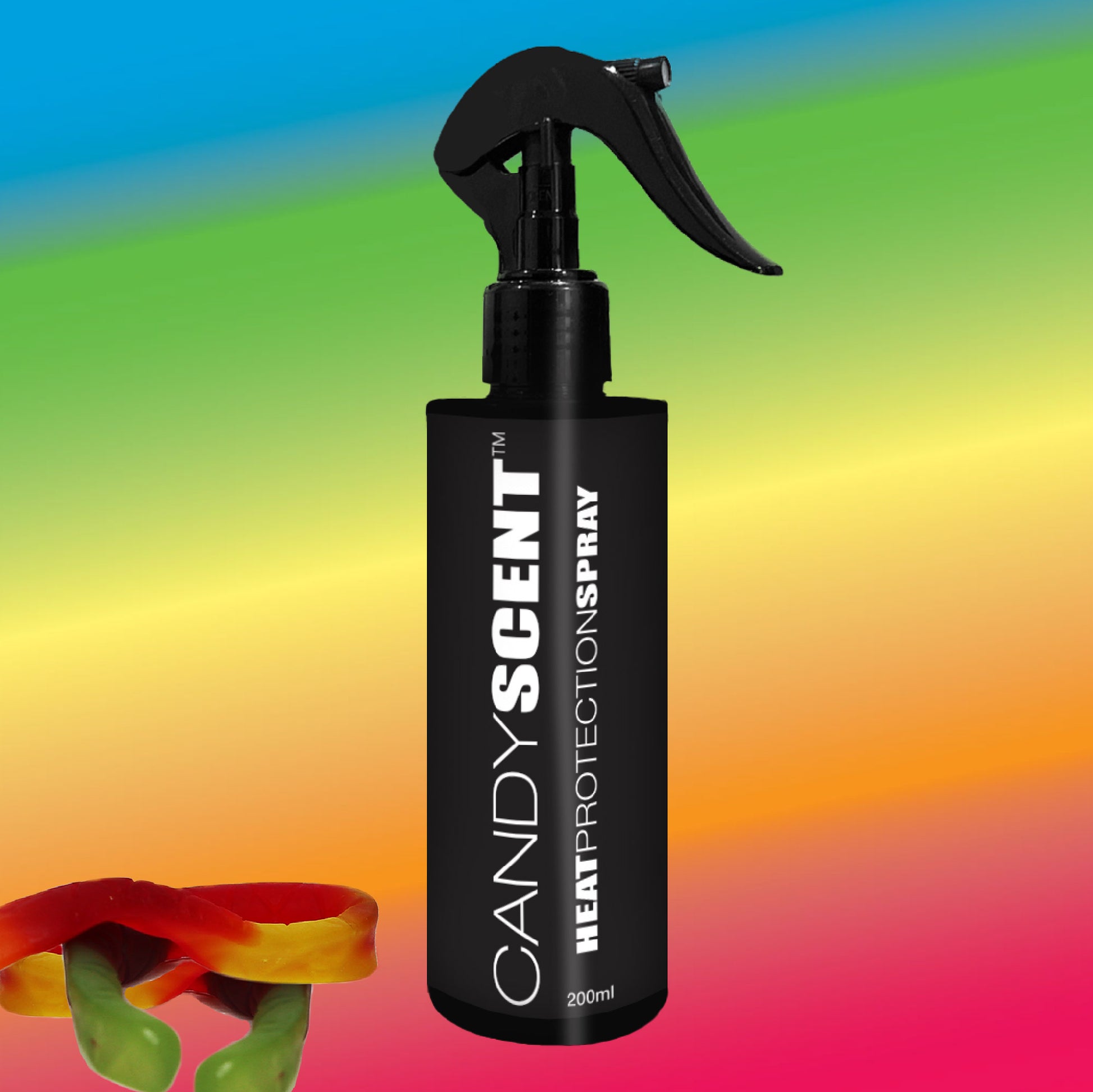 A black spray bottle labeled "CANDYSCENT™ Heat Protection Spray" promises salon-quality results against a colorful gradient background. In the corner, gummy candies shaped like lips and legs add a playful touch.