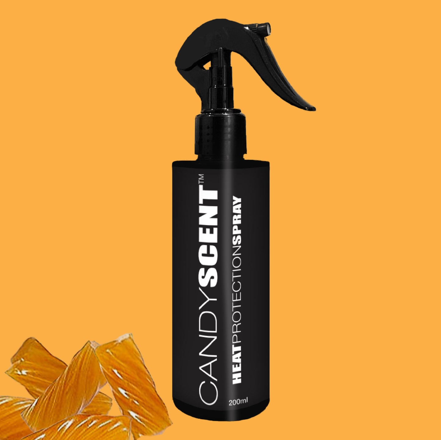 A bottle of CANDYSCENT™ Heat Protection Spray, recognized for its hair strengthening benefits, is prominently displayed on an orange background. It features a trigger nozzle and is accented by candy pieces in the bottom left corner, promising salon-quality results.