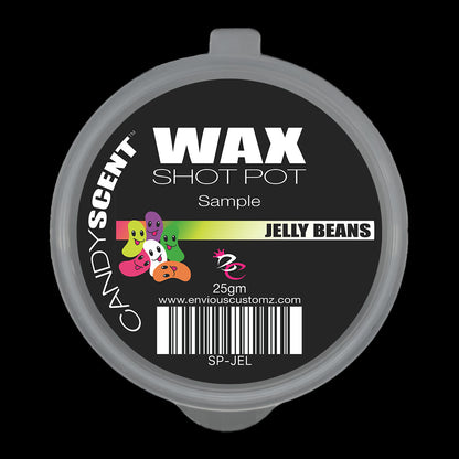 A round container of the discontinued CANDYSCENT™'s Wax Melts features a whimsical cartoon of colorful jelly beans. The label, highlighting "JELLY BEANS" and a website link, includes a barcode and "25gm." This delightful option in home fragrance comes with a sleek gray lid, perfect for wax melts enthusiasts.