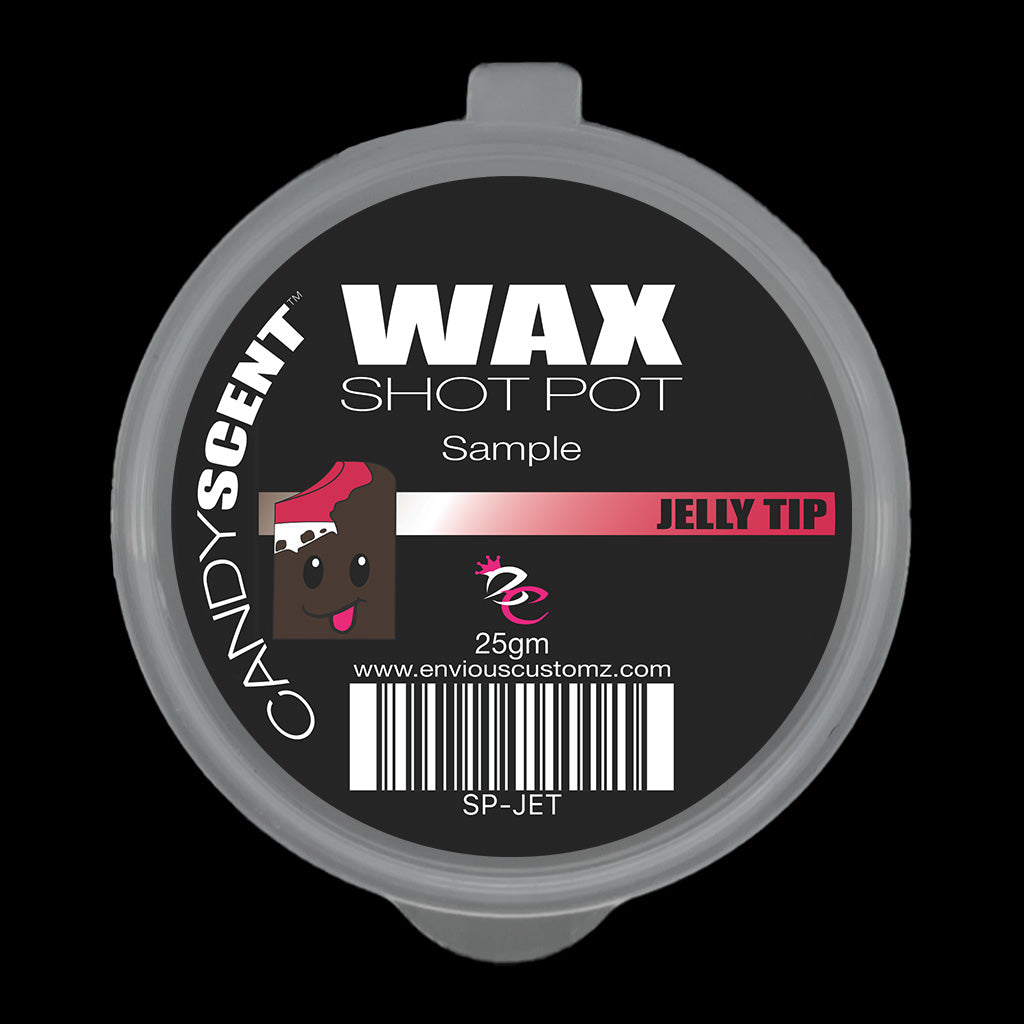 A small, round container labeled as "(DISCONTINUED CANDYSCENT™'S) Wax Melts" fills your space with the delightful home fragrance of "Jelly Tip." The label features a cartoon chocolate square with eyes and a red topping. Visit "www.enviouscustomz.com" for these 25-gram wax melts from CANDYSCENT™.