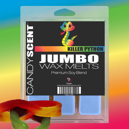 The image shows a package of Jumbo Wax Melts by CANDYSCENT™, labeled "Killer Python" with a cartoon snake illustration. The packaging displays "Premium Soy Blend" beneath the snake image. In front of the package are colorful gummy candies shaped like snakes, promising a long-lasting aroma.