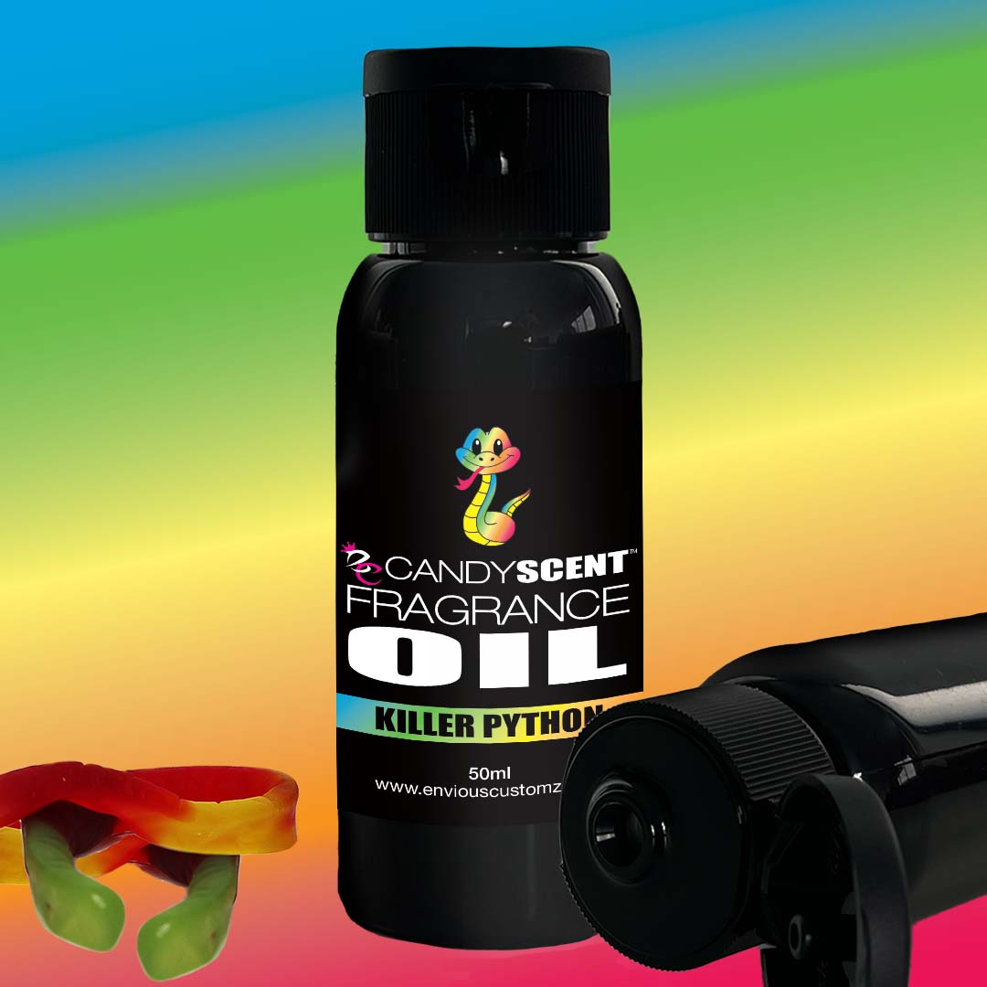 A bottle of CANDYSCENT™ Fragrance Oil - Killer Python, featuring a cartoon snake against a colorful gradient background. The black label showcases the product name, with gummy snake candies visible in the lower left corner, making it perfect for your home scent or oil burner.