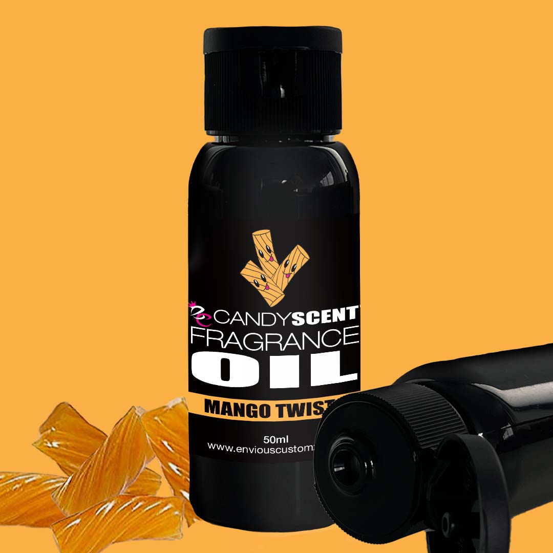 A 50ml bottle of CANDYSCENT™ Fragrance Oil in the Mango Twist variant. The black bottle showcases an illustrated design featuring yellow candy sticks and text on the label, set against an orange background with scattered yellow candy pieces. Ideal for use in your oil burner, this fragrance oil brings a delightful home scent experience. The brand's URL is also visible.