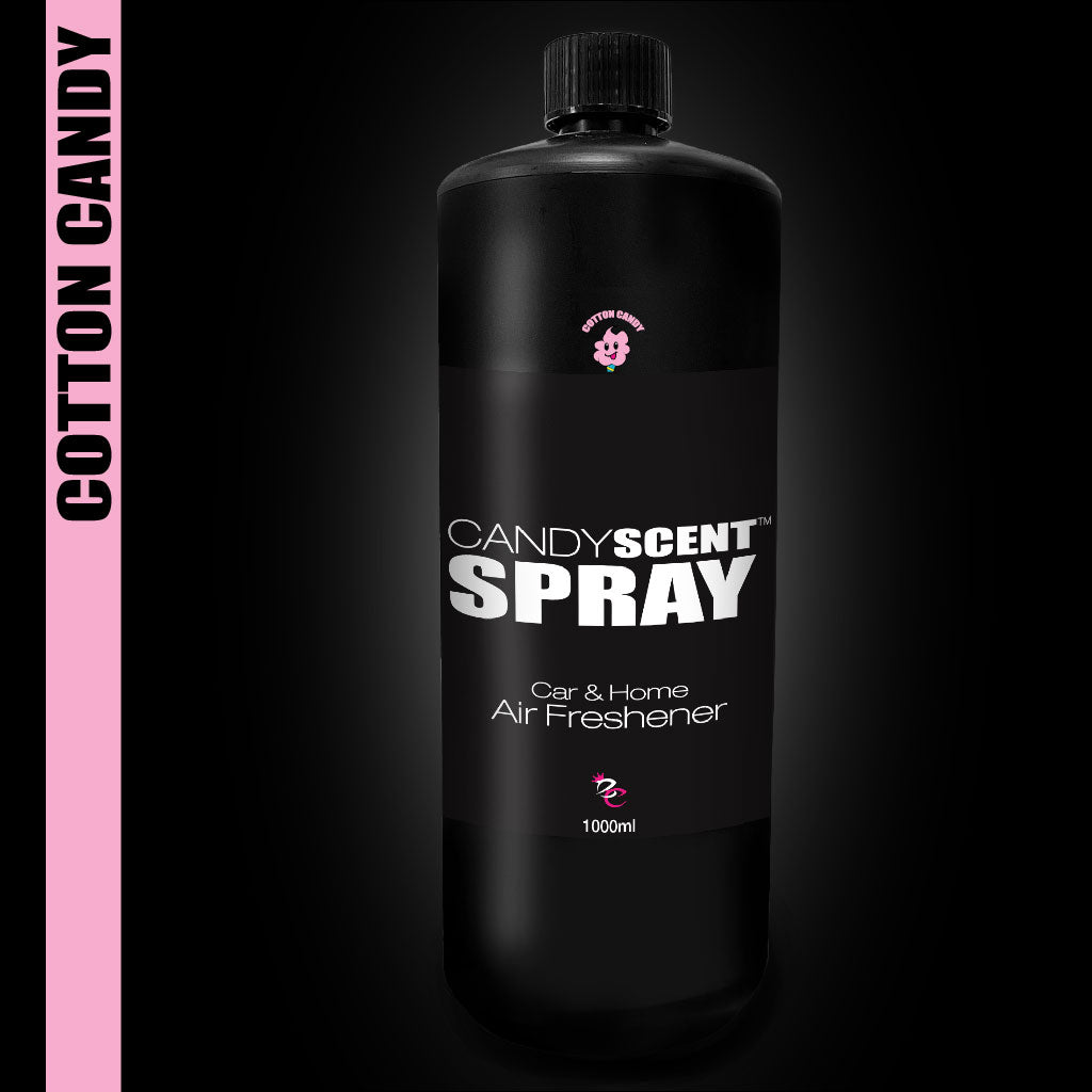 A sleek black bottle of CANDYSCENT™ Car & Home Scent Spray, ideal for eliminating odors with its long-lasting cotton candy fragrance. The design features a pink side border labeled "Cotton Candy" and a charming pink teddy bear logo. Contains 1000ml.