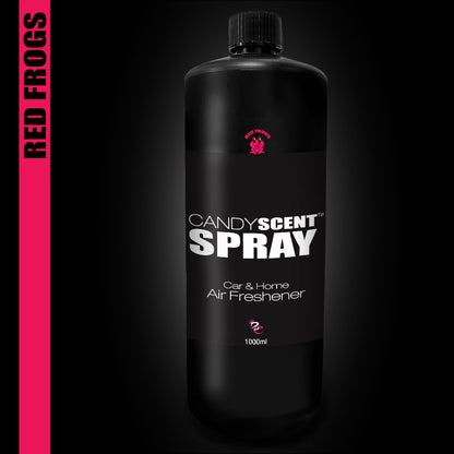 The image shows a CANDYSCENT™ Car & Home Scent Spray in a black bottle, showcasing the delightful scent "Red Frogs." The 1000ml air freshener ensures lasting fragrance, highlighted by an adorable red frog icon above its label.