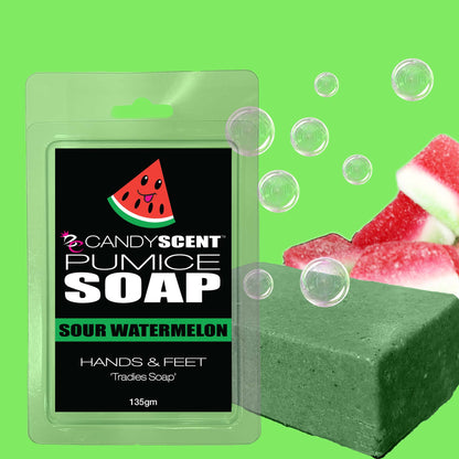 A package of CANDYSCENT™ Pumice Soap with a Sour Watermelon fragrance is pictured against a bright green background. The packaging features a watermelon graphic, bubbles floating around, and pieces of sour watermelon candy next to the exfoliating soap bar, perfect for tradies needing an invigorating cleanse.