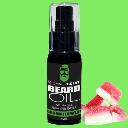 A black bottle of CANDYSCENT™ Beard Oil, featuring a mask-wearing bearded mascot on the label, is set against a vibrant green background. The bottle's text reads "With Hemp & Green Tea Extract, Sour Watermelon, 50ml." Next to the bottle are two pieces of watermelon candy, making it a grooming essential for optimal beard health.