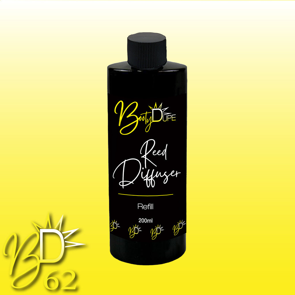 A black 200ml bottle of Reed Diffuser Refill from BOOTY DUPE is displayed against a gradient yellow background. The bottle features the brand's logo in yellow and white, reading "BOOTY DUPE Reed Diffuser Refill." The letters "B" and "D" and the number "62" are displayed at the bottom left corner in yellow.